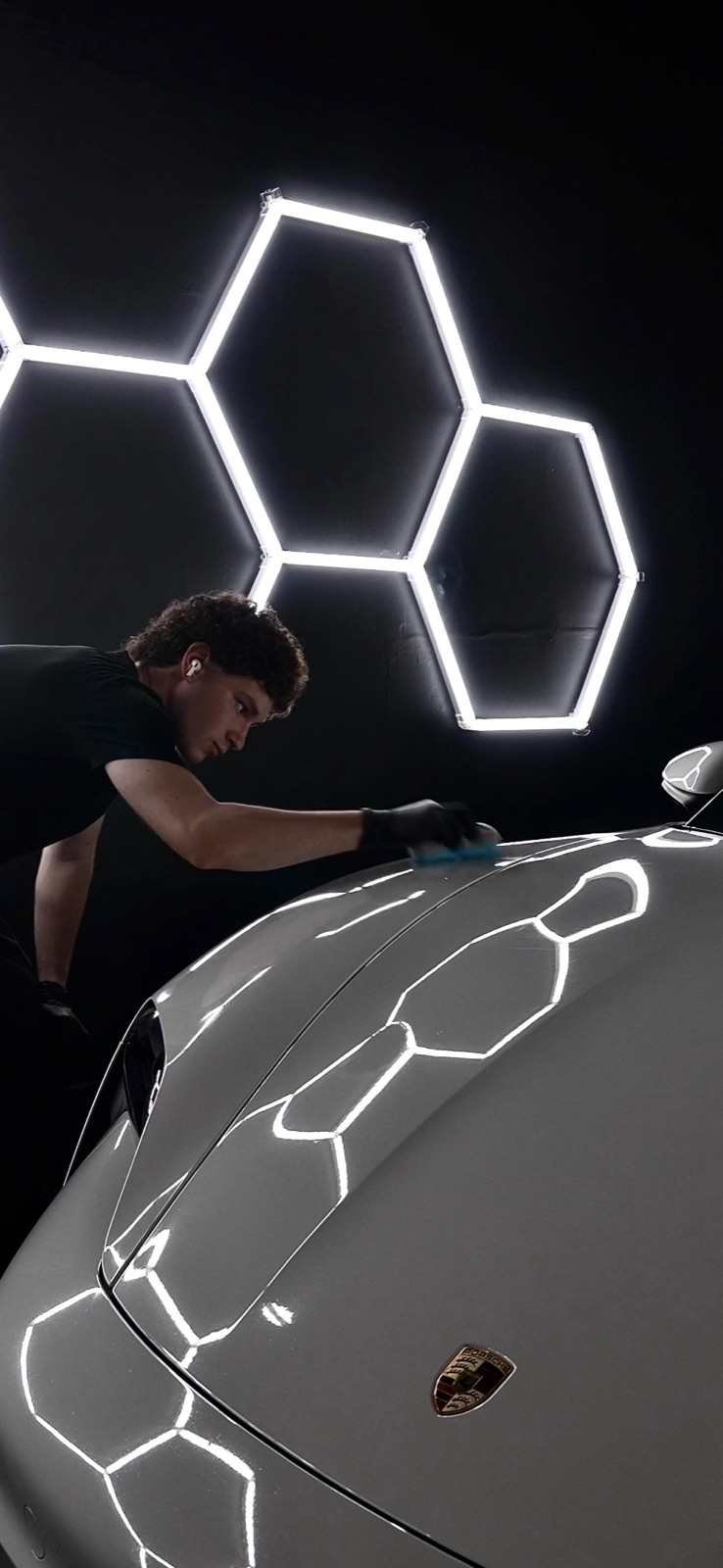 Regency Auto Protection technician ceramic coating a Porsche